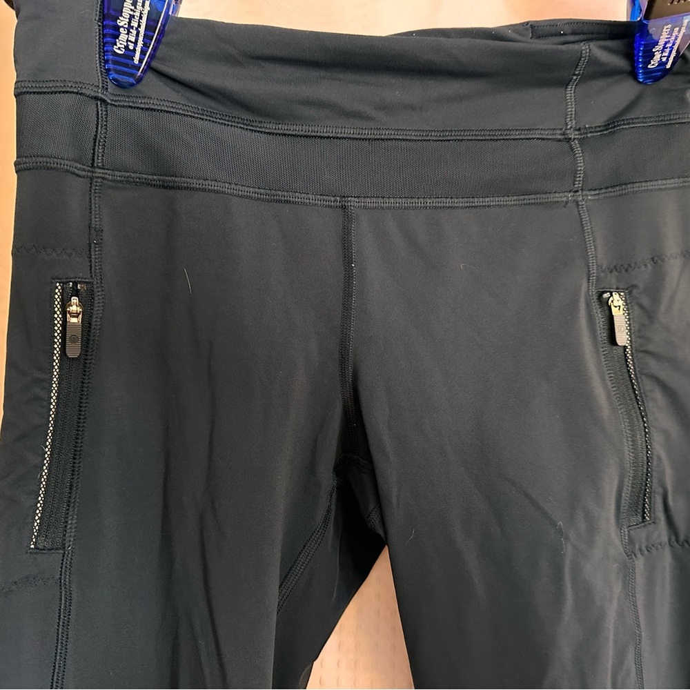 Lululemon leggings, bluish grey. Size 2, full legging, mesh trim on bottom.